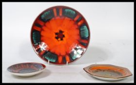 Three pieces of vintage retro Poole pottery to include an Aegean pattern dish and two more dishes of