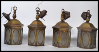 A set of four 20th century Georgian revival Porch lanterns each of hexagonal form with clear glass
