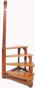 A good set of 20th century mahogany library steps. The steps of spiral form culminating in a