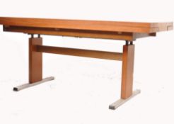 An unusual 1970's / 20th century teak wood metamorphic wind up coffee occasional table / dining