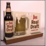 A good 20th century, circa 1970's Piels Beer Real Draft light up pub / shop advertising sign