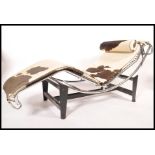 A modern Italian chrome metal framed LC4 adjustable chaise lounge after Le Corbusier, upholstered in