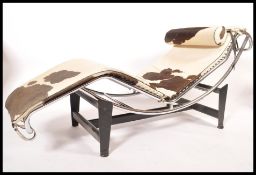 A modern Italian chrome metal framed LC4 adjustable chaise lounge after Le Corbusier, upholstered in