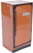 A 1950's tin plate child's American refrigerator by Wolverine. The upright body with brown finish