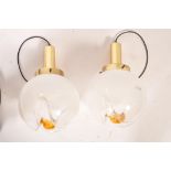 A pair of vintage retro 20th century Mazzega Murano flower pendant ceiling lights. The white bowls