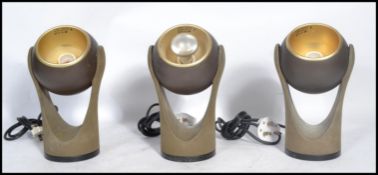 A set of three retro 20th century ceiling spot ball lights by Insta Electro. 24cm.