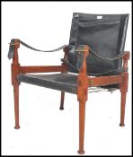 A vintage retro 20th century M Hayat Brothers Safari chair / Campaign teak and leather armchair