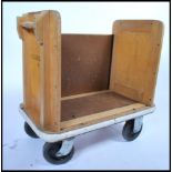 A mid century library trolley from Colindale Library London. The trolley of beech wood
