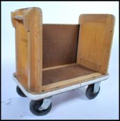 A mid century library trolley from Colindale Library London. The trolley of beech wood