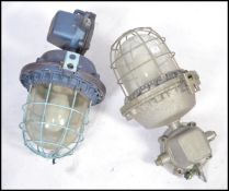 A good pair of Industrial heavy extreme condition drop pendant bulkhead lights of large form with