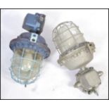 A good pair of Industrial heavy extreme condition drop pendant bulkhead lights of large form with