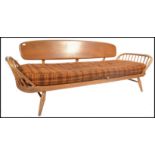 An original Ercol 1970's day bed sofa settee complete with the original cushion. Light beech and elm