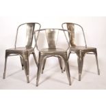 A set of original 20th century stacking metal Tolix chairs constructed of polished steel with