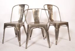 A set of original 20th century stacking metal Tolix chairs constructed of polished steel with