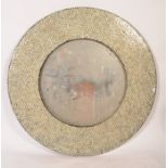 A 20th century large circular wall mirror, the mirror frame having a mosaic style finish being