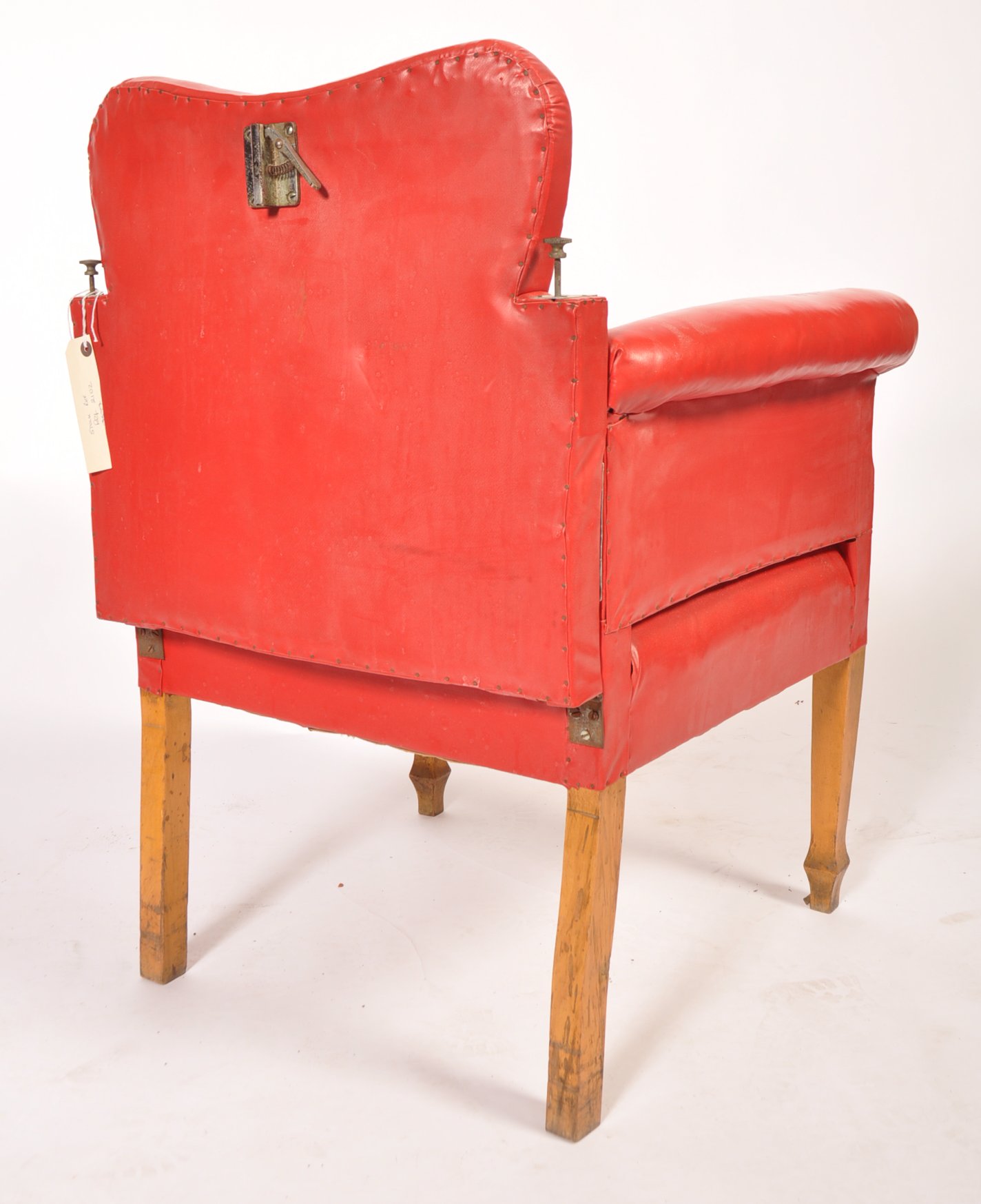 An early 20th century red leather barbers chair. The chair raised on beech wood tapering square legs - Image 7 of 7