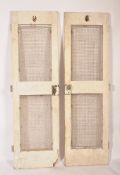 A rare pair of early 20th century painted wooden teak tug boat doors - ships galley doors. Each with