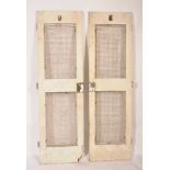 A rare pair of early 20th century painted wooden teak tug boat doors - ships galley doors. Each with