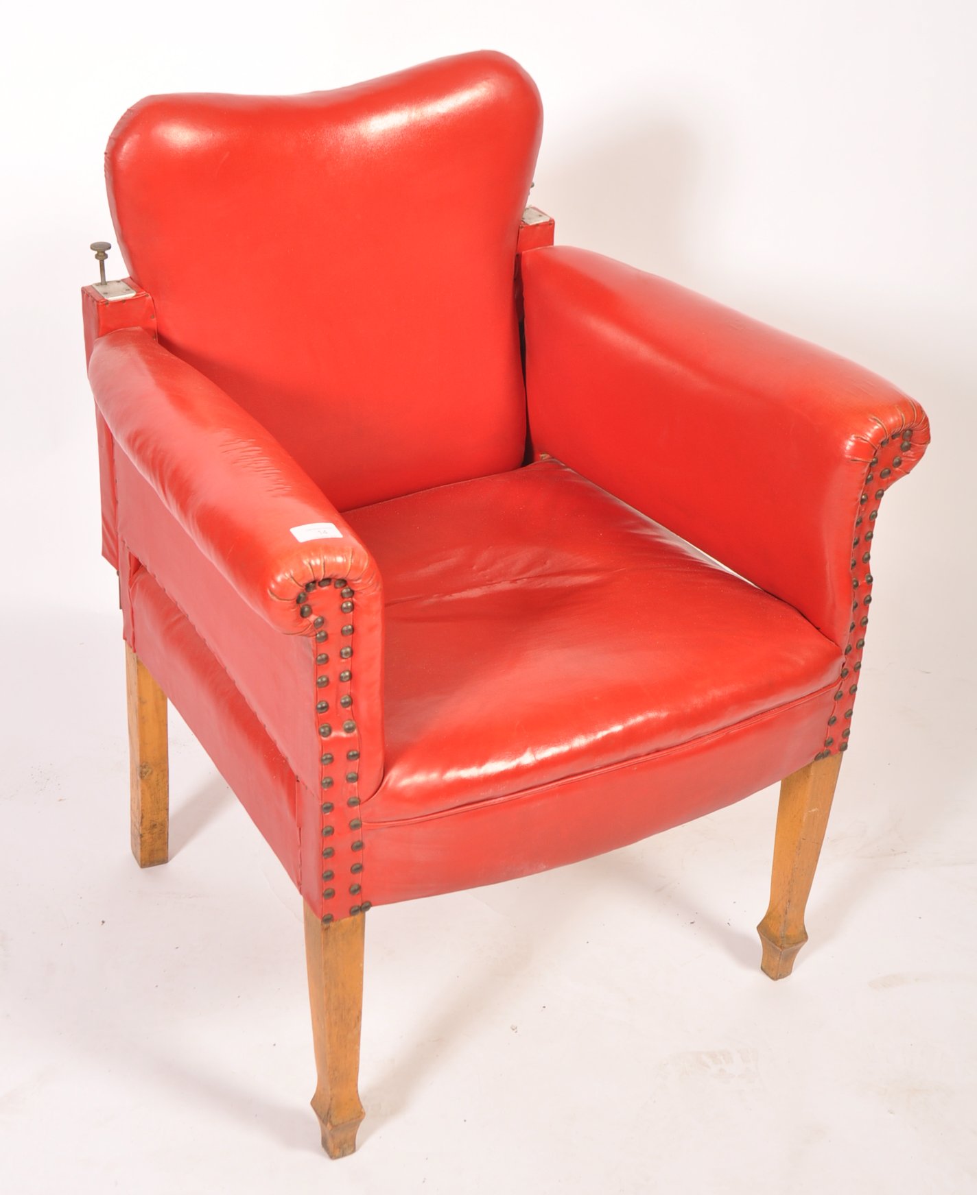 An early 20th century red leather barbers chair. The chair raised on beech wood tapering square legs - Image 2 of 7