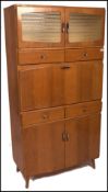 A mid 20th century oak kitchen dresser cabinet . The oak cabinet having cupboards and drawers to the