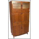 A mid 20th century oak kitchen dresser cabinet . The oak cabinet having cupboards and drawers to the