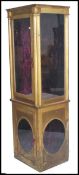 A 19th century French Parisien shop display cabinet. Of upright pedestal form with gilt finish