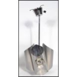 A vintage 20th century retro 1970's chrome ceiling light having three light sconces of shaped