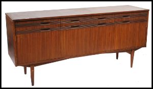 A 1960's / mid century retro teak wood sideboard in the manner of Robert Heritage for Archie