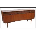 A 1960's / mid century retro teak wood sideboard in the manner of Robert Heritage for Archie