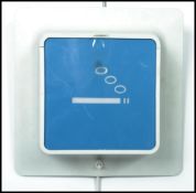 A retro 20th century, circa 1980's medical - industrial light up sign with white box having blue