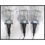 A set of 3 French modern Industrial style trouble cage lamps - inspection lamps with rubber