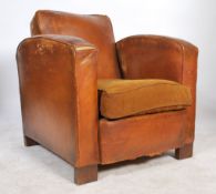 A 1930's Art Deco French club chair - armchair. Full grain original leather with yellow dusk