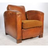 A 1930's Art Deco French club chair - armchair. Full grain original leather with yellow dusk