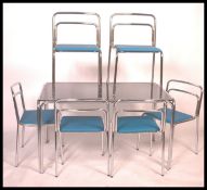 A superb 1970's chrome and glass dining table and chairs set. The 6 chrome chairs have been recently