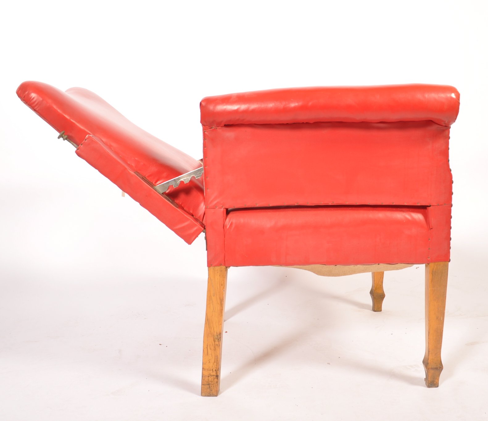 An early 20th century red leather barbers chair. The chair raised on beech wood tapering square legs - Image 5 of 7