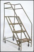 A stunning  vintage / retro industrial - Library - mobile ladder constructed from a tubular metal