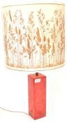 A oof retro vintage mid century Shatterline amber type resin lamp base in red and of rectangular