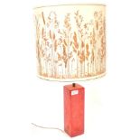 A oof retro vintage mid century Shatterline amber type resin lamp base in red and of rectangular