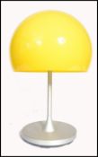 After Verner Panton - Flowerpot - A 20th century table lamp having a domed vibrant yellow plastic