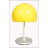 After Verner Panton - Flowerpot - A 20th century table lamp having a domed vibrant yellow plastic