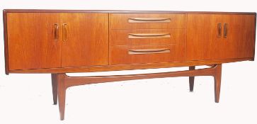 A 1970's - 20th century G-Plan ' Fresco ' pattern teak wood sideboard raised on tapering legs with a