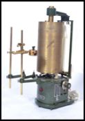 A vintage mid century scientific seismograph having brass cylinder and arms with paper and needle