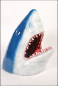 A 20th century large and unusual resin cast moulded shop advertising in the form of a Sharks head.