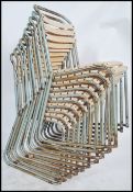 A good stack of 10 mid century village hall - working men's club stacking chairs in the original