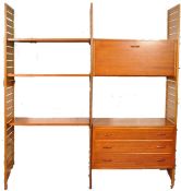 A 1970's / 1980's retro Ladderax Staples modular wall system comprising upright wooden racks with