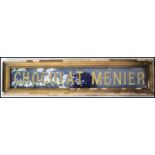 An early 20th century glass shop sign for ' Chocolat Menier ' The rectangular sign with gilded