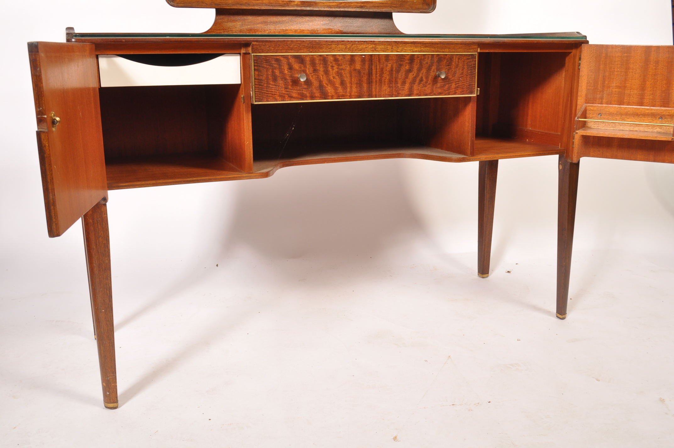 A 1970's teak wood space age dressing table being raised on tapering squared legs with a series of - Image 6 of 6