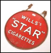 A vintage 20th century shop advertising enamel sign for Wills’s Star Cigarettes, issued by the