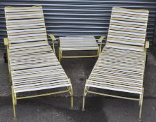 A rare pair of mid century American pool / garden loungers in stunning banana yellow colour. Metal