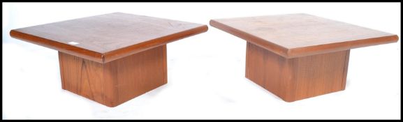 A pair of low, small mid 20th century Hornbaek Danish teak wood coffee - side table. Each raised